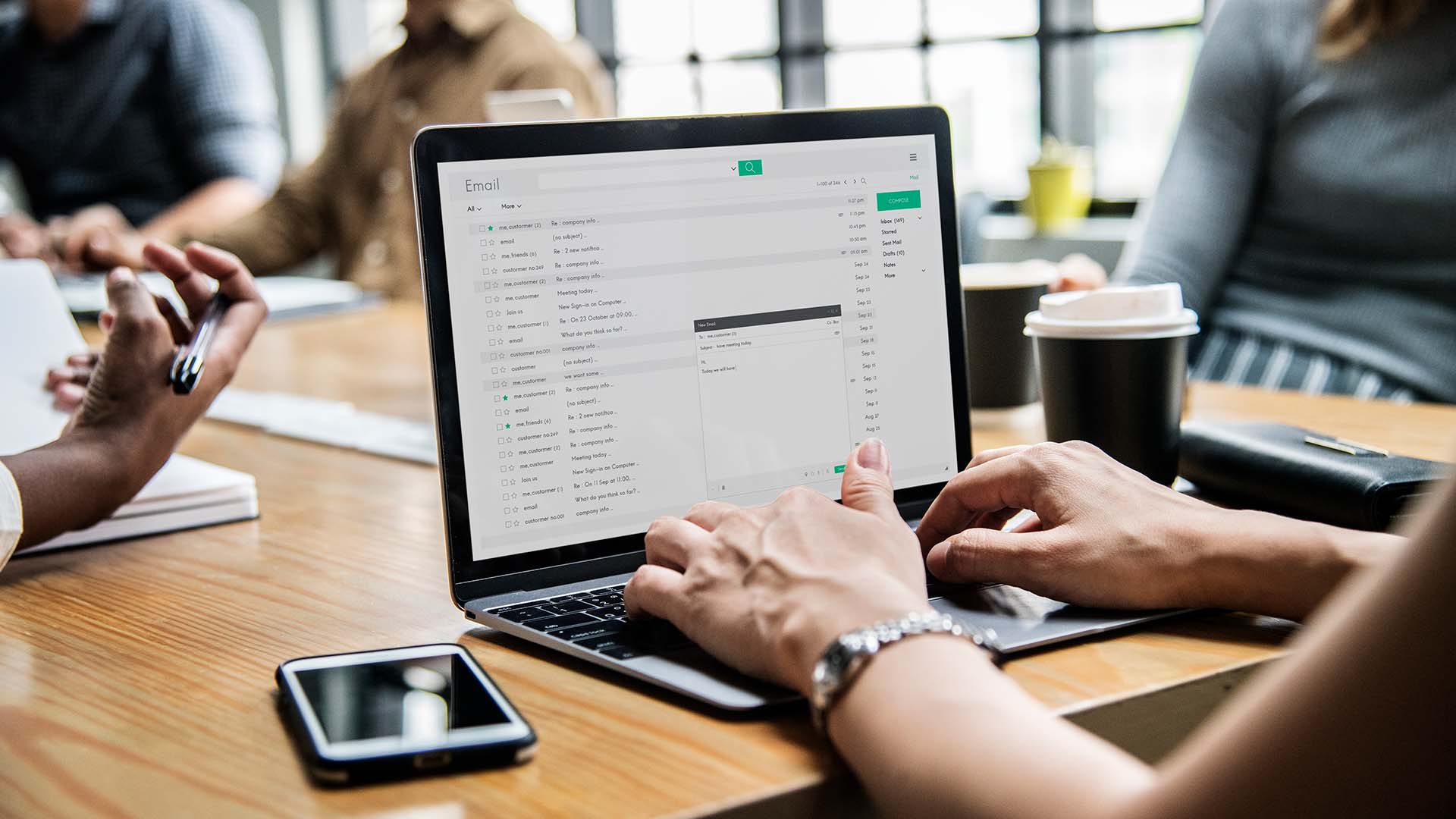 Businesswoman Reviewing Email Campaign Strategy for Landscaping Marketing