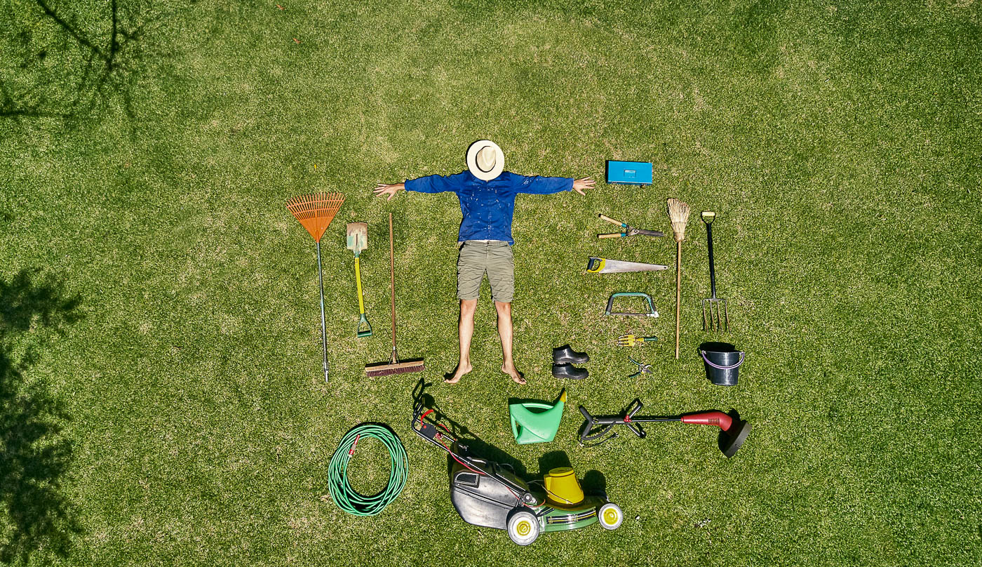 Gardener With Tools Flat Lay On Lawn