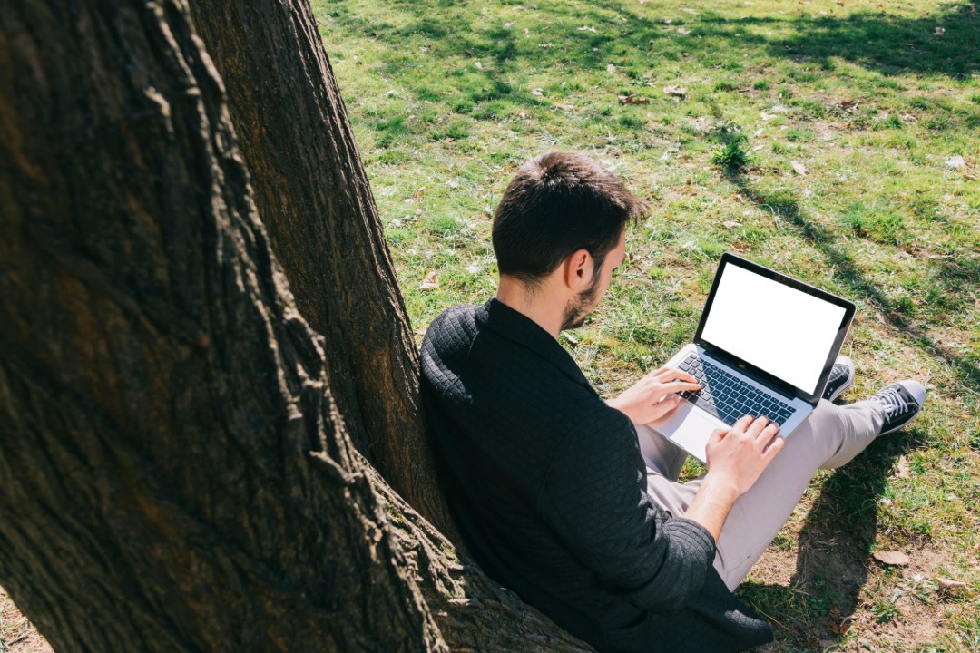 landscaper working on a laptop