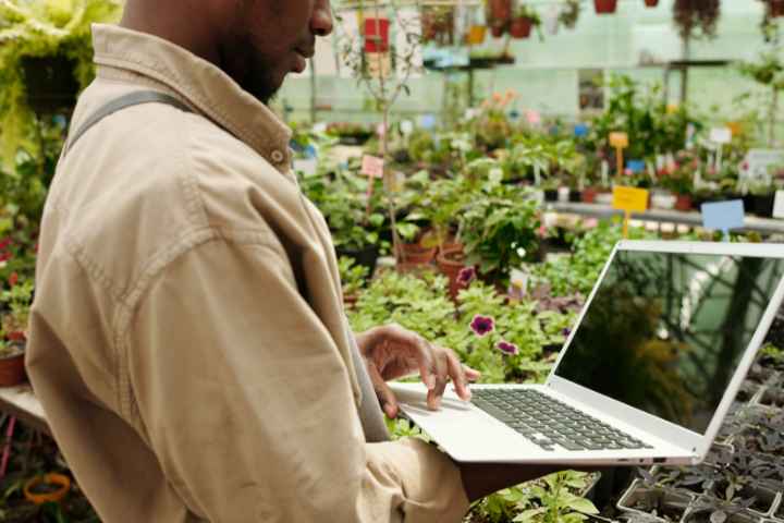 Landscaper Using Laptop