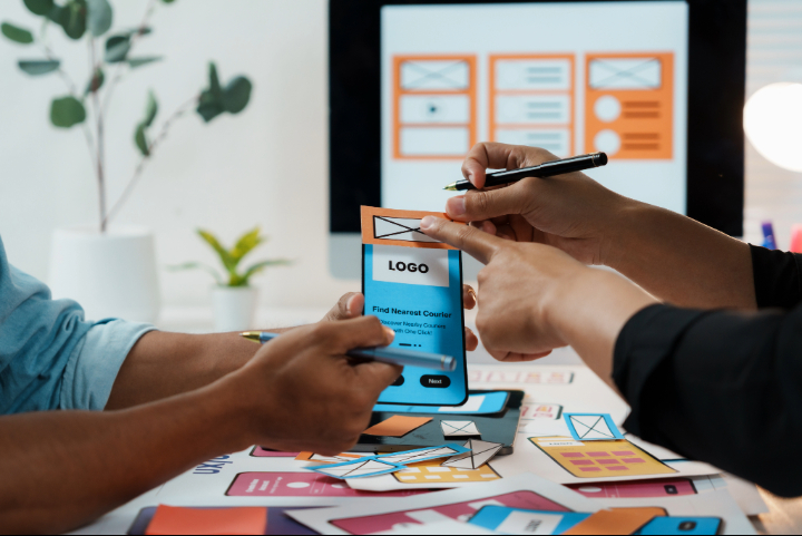 Landscaping Business Owner Discussing Rebranding Design